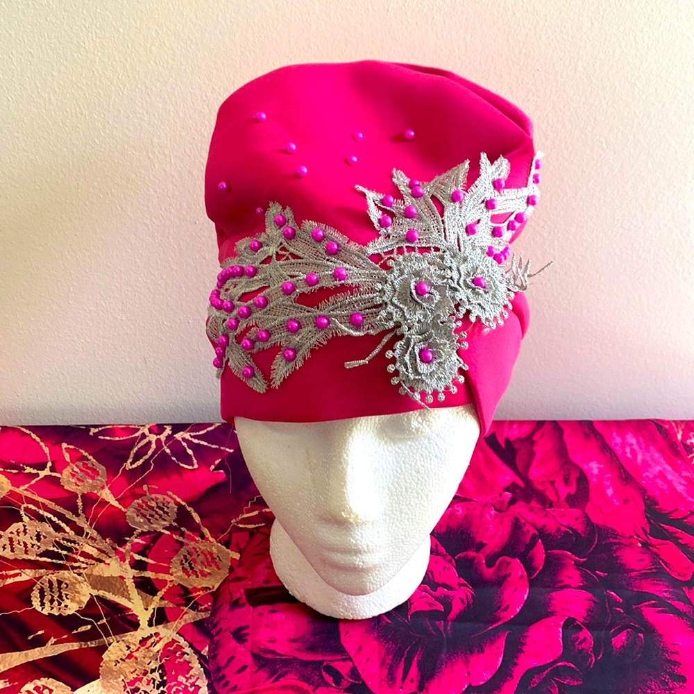 Fuchsia, fitted, tam/hat. Smoke free environment and no pets.